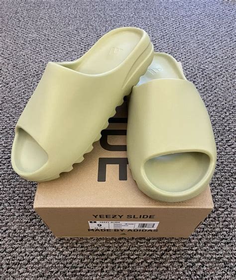 Yeezy slides resin - Jun 2, 2022 · YEEZY SLIDE Resin A true example of Ye’s dedication to minimalistic design, the Yeezy Slide ‘Resin’ athletic sandal comes with monochromatic finish in a subtle green hue. It was first released in December 20219 along with the two other colorways – Desert Sand and Bone, and launchined exclusively on YEEZY SUPPLY in family sizes, for the ... 